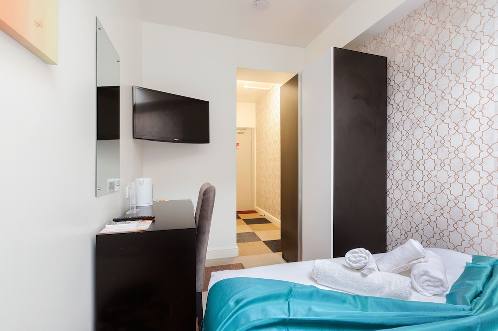 Habitación económica doble, baño privado del hotel Central Hoxton Shoreditch. Foto 1