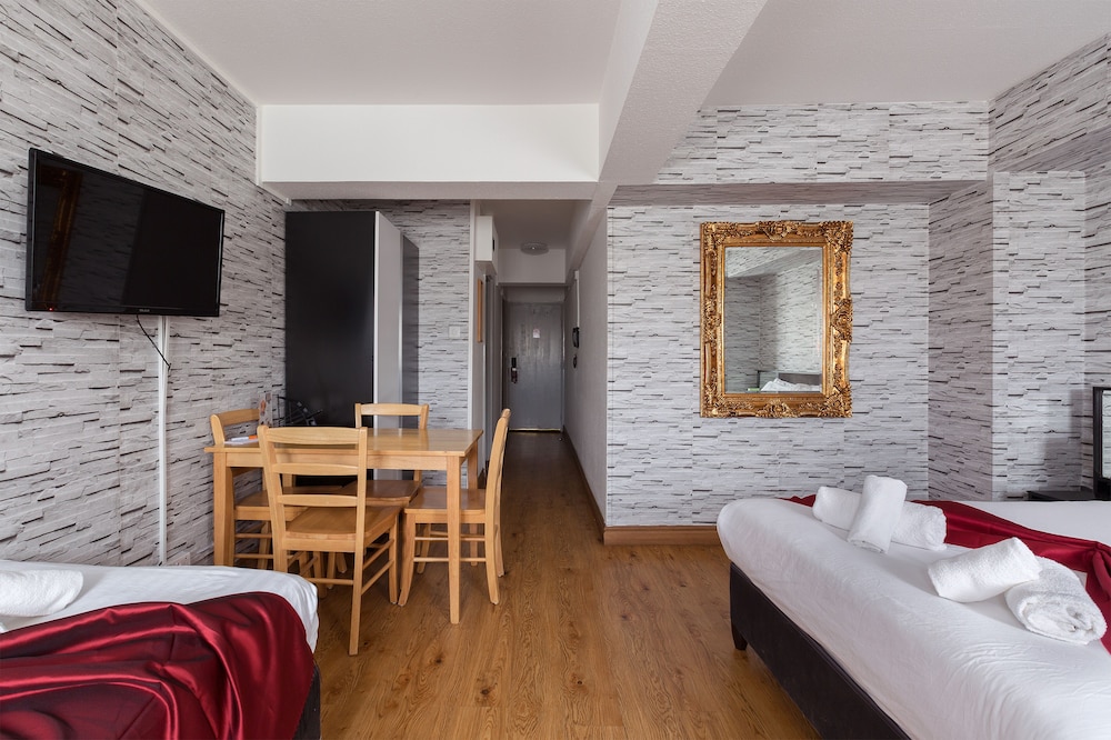 Habitación triple Confort, baño privado del hotel Central Hoxton Shoreditch. Foto 5