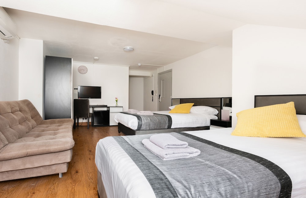 Habitación triple superior, baño privado (Triple Studio) del hotel Central Hoxton Shoreditch. Foto 2