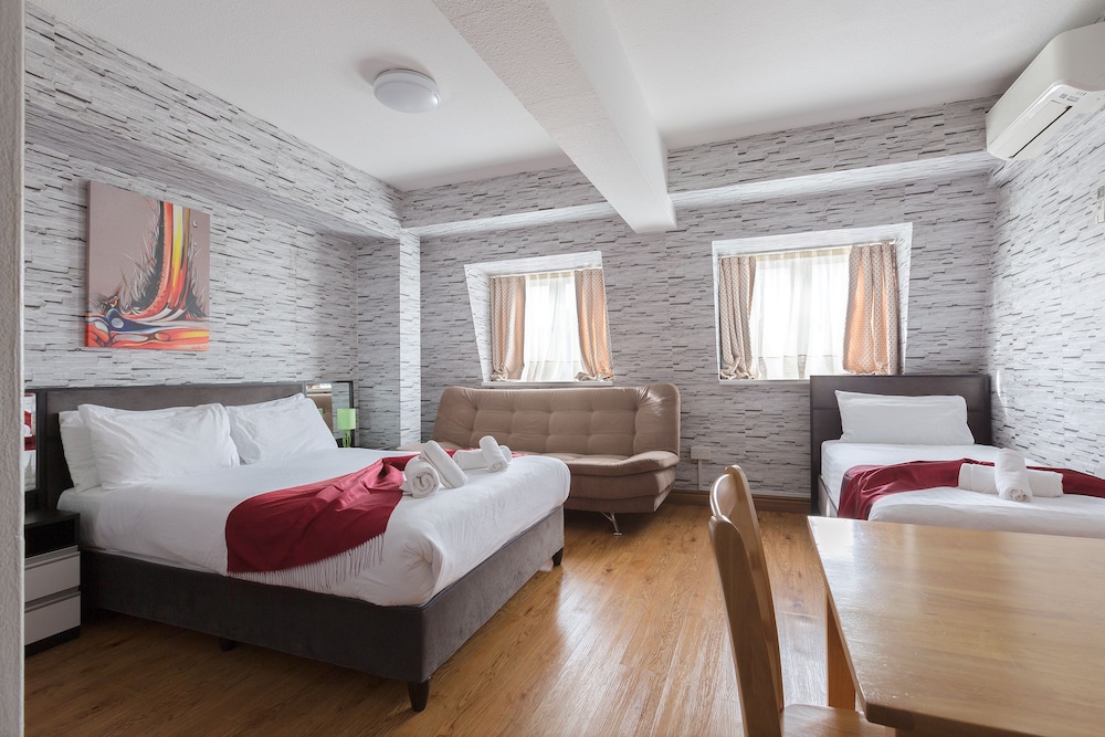 Habitación triple superior, baño privado (Triple Studio) del hotel Central Hoxton Shoreditch. Foto 3