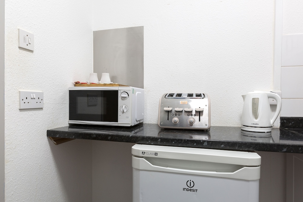 Habitación triple superior, baño privado (Triple Studio) del hotel Central Hoxton Shoreditch. Foto 11