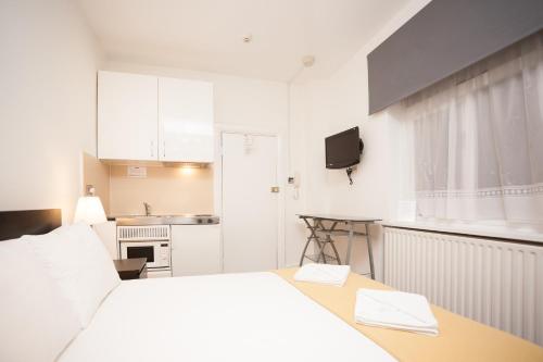 Estudio Doble Deluxe del hotel Hyde Park Talbot Square Apartments. Foto 17