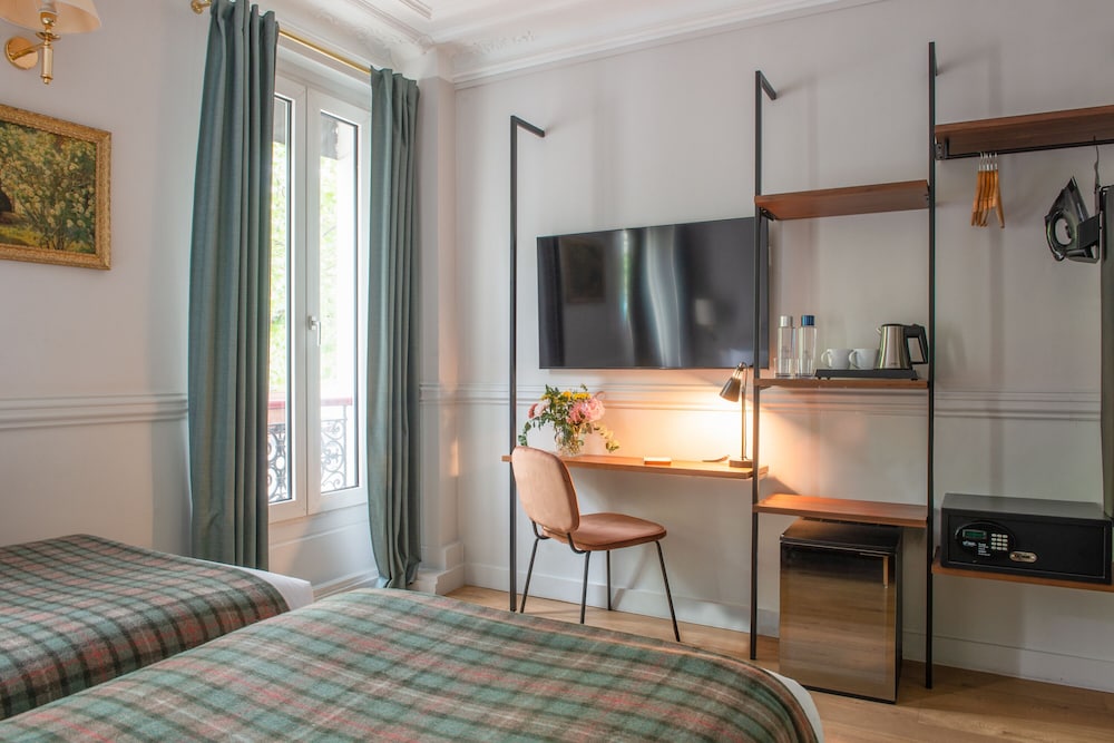 Habitación Premium con 2 camas individuales del hotel De La Porte Dorée. Foto 1