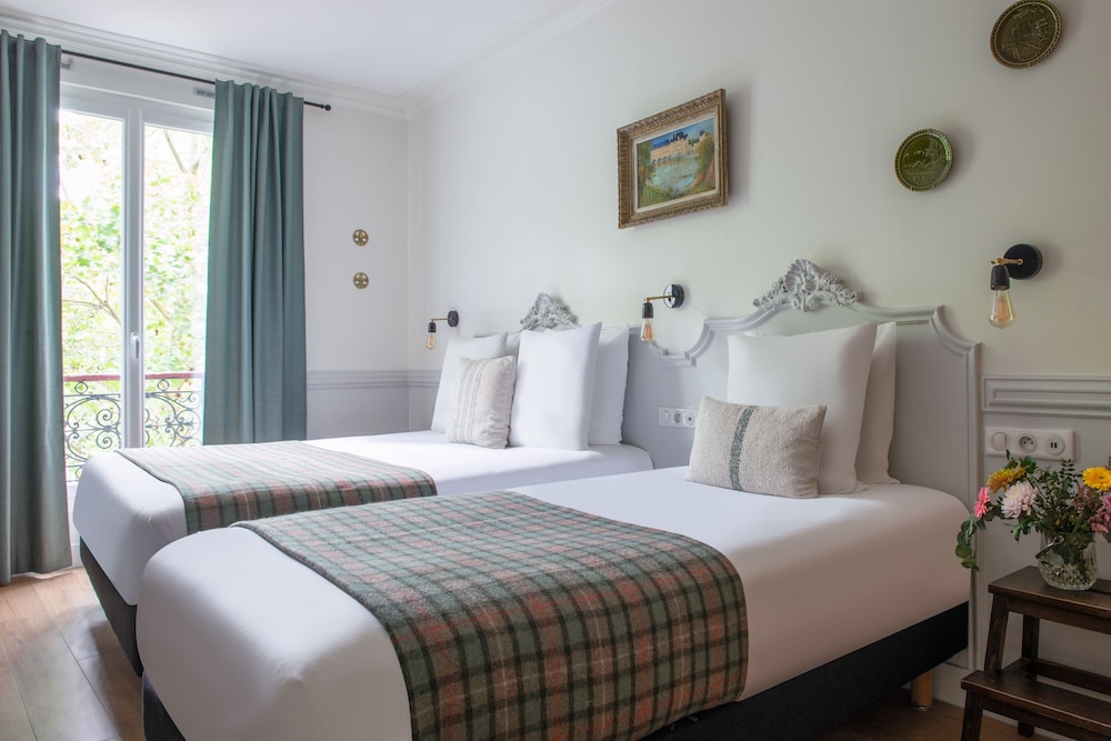 Habitación triple Premium del hotel De La Porte Dorée