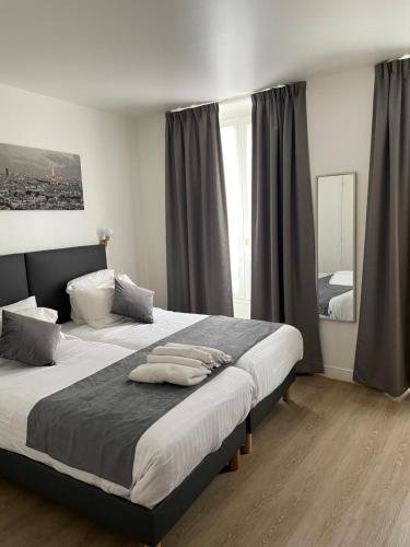 Habitación Doble - 2 camas del hotel De Bordeaux. Foto 2