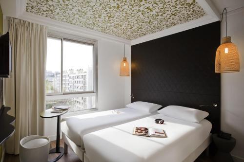 Habitación Doble - 2 camas del hotel Ibis Styles Paris Buttes Chaumont. Foto 5