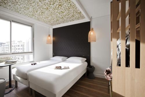 Habitación Doble - 2 camas del hotel Ibis Styles Paris Buttes Chaumont. Foto 6
