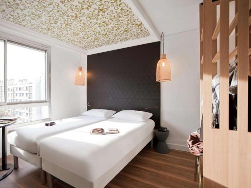 Habitación Doble - 2 camas del hotel Ibis Styles Paris Buttes Chaumont. Foto 8