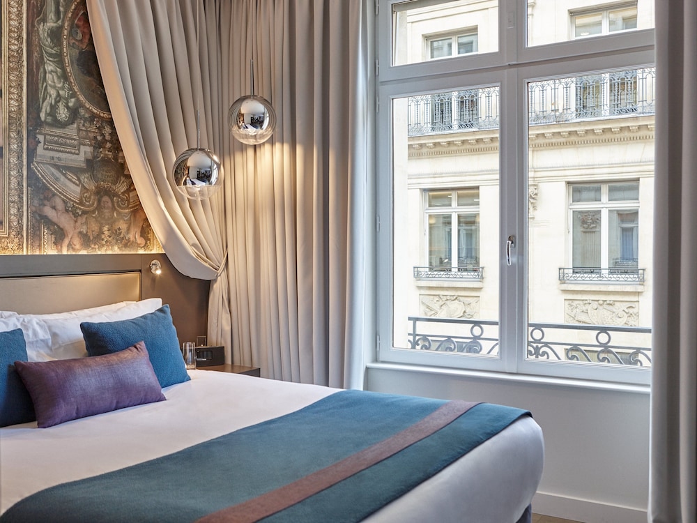 Habitación Premium del hotel Indigo Paris Opera. Foto 1