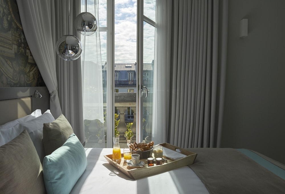 Habitación Premium, 2 camas individuales del hotel Indigo Paris Opera. Foto 8