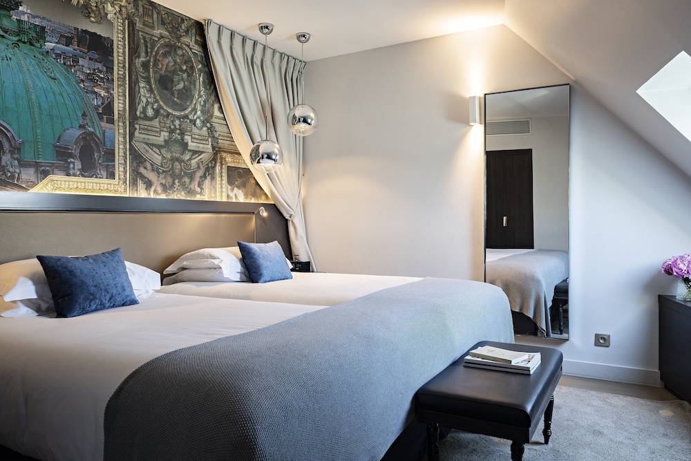 Habitación, 2 habitaciones del hotel Indigo Paris Opera. Foto 6