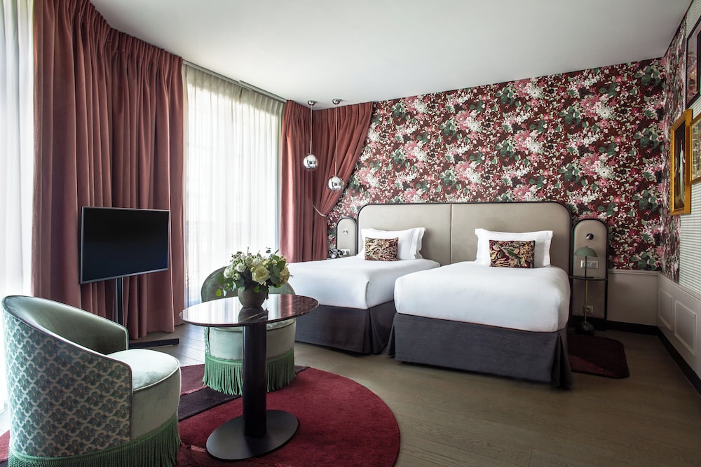 Habitación Premium, 2 camas individuales del hotel Indigo Paris Opera. Foto 1