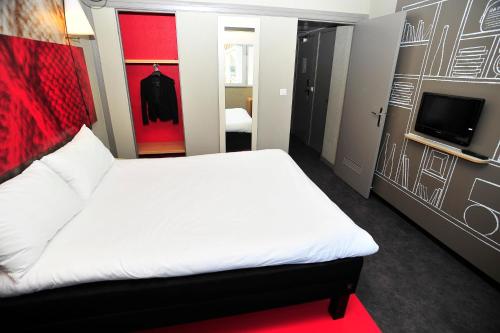 Habitación Doble Confort del hotel Ibis Lyon Centre. Foto 8