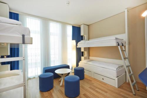 Habitación Cuádruple Confort del hotel H2 Hotel Munchen Messe