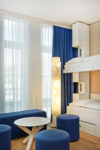 Habitación Cuádruple Confort del hotel H2 Hotel Munchen Messe. Foto 6