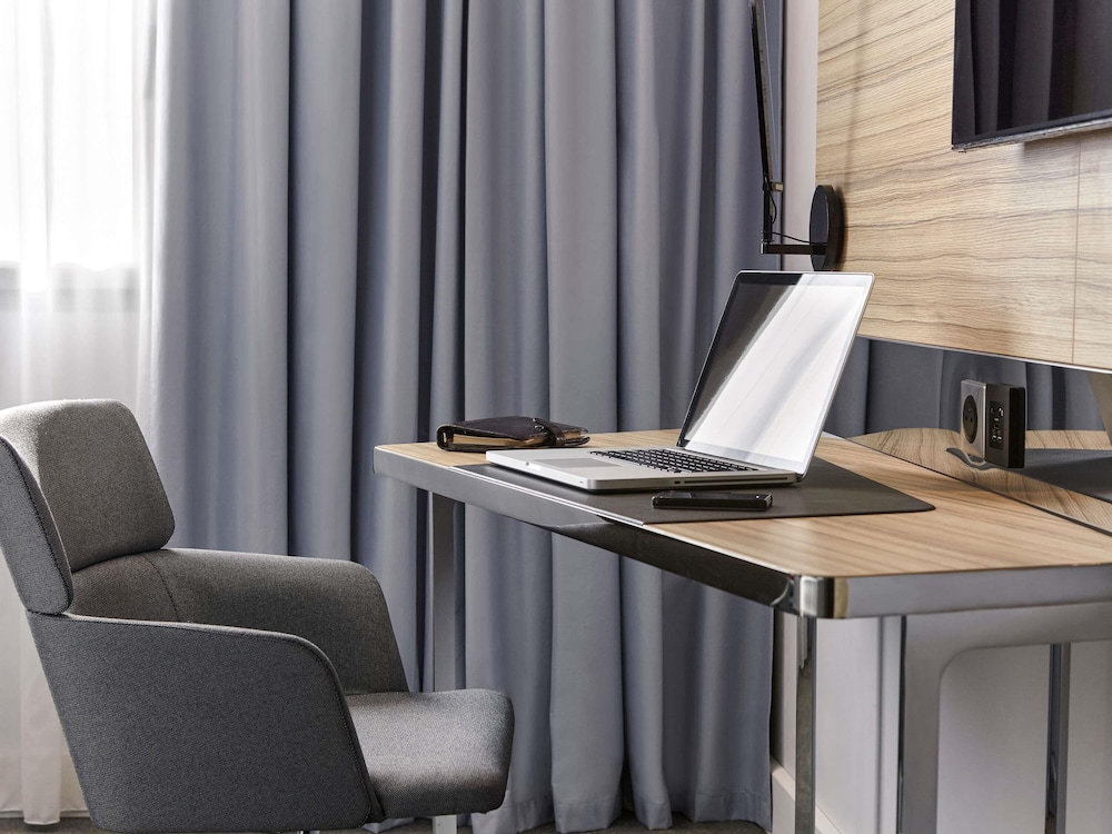 Habitacion Superior con 1 cama doble y Sofa del hotel Novotel München City Arnulfpark. Foto 9