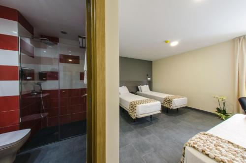 Habitación Triple del hotel Puerto Canteras. Foto 1