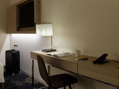 Habitación Estándar con ducha - Cama grande del hotel Millennium Mitsui Garden Tokyo/ginza. Foto 3