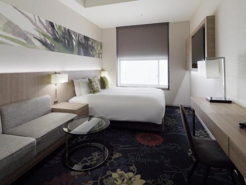 Habitación Estándar con ducha - Cama grande del hotel Millennium Mitsui Garden Tokyo/ginza. Foto 6