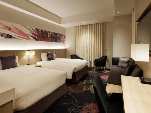 Habitación Doble Deluxe esquinera - 2 camas del hotel Millennium Mitsui Garden Tokyo/ginza. Foto 2