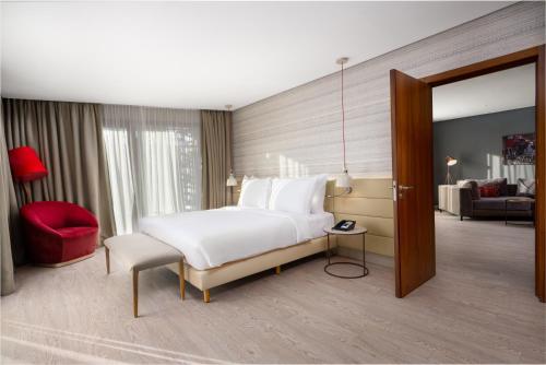 Suite con terraza del hotel Radisson Blu , Marrakech Carré Eden. Foto 8