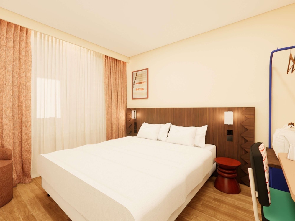 Habitación doble superior, 1 cama doble con sofá cama del hotel ibis Styles Lyon Gerland. Foto 1
