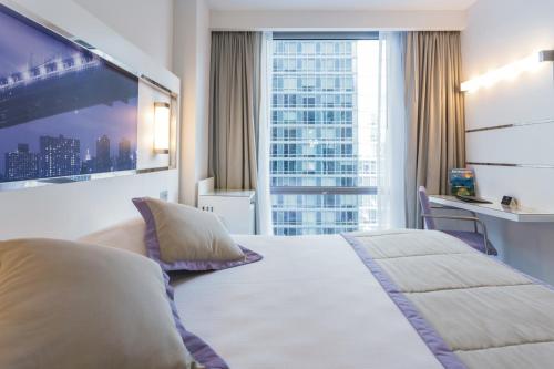 Habitación Deluxe - 1 cama grande del hotel Riu Plaza New York Times Square. Foto 3
