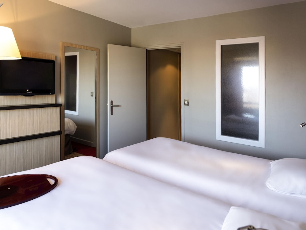 Habitación estándar con dos camas individuales del hotel Ibis Styles Saint Dizier. Foto 7