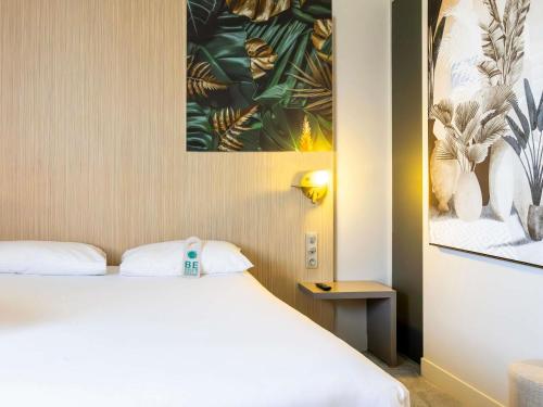 Habitación estándar con dos camas individuales del hotel Ibis Styles Troyes Centre. Foto 2