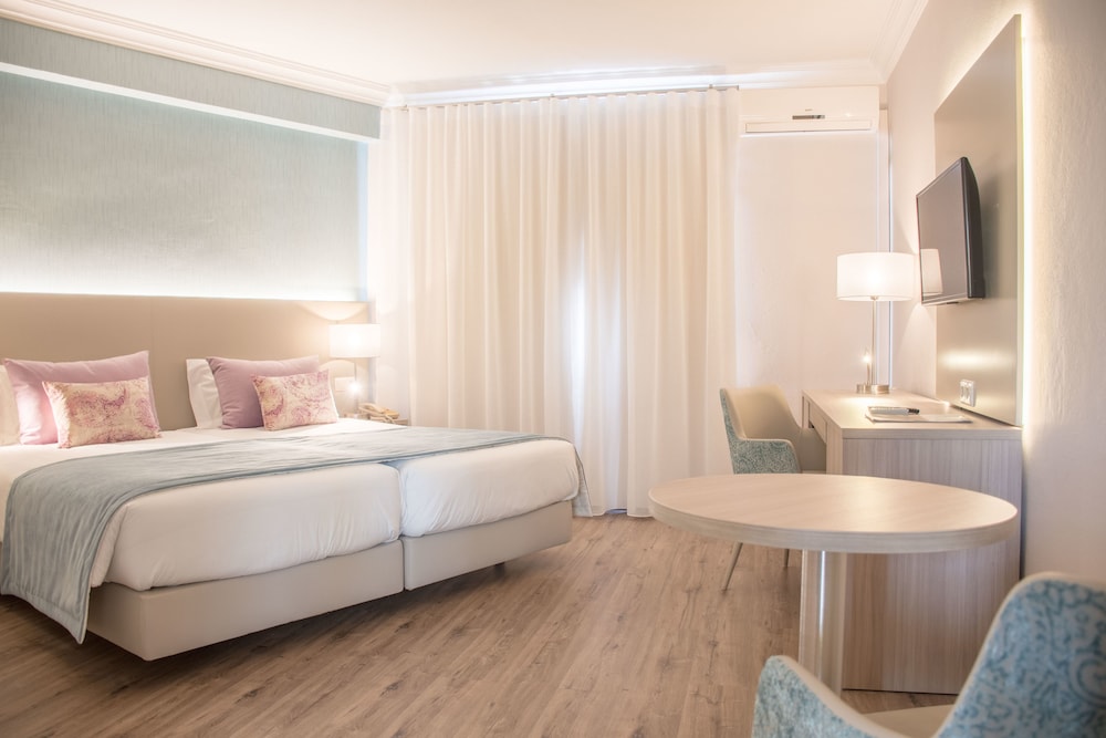 Habitación superior con 2 camas individuales del hotel Loule Jardim
