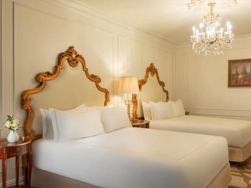 Habitación Deluxe con 2 camas grandes del hotel The Plaza. Foto 2