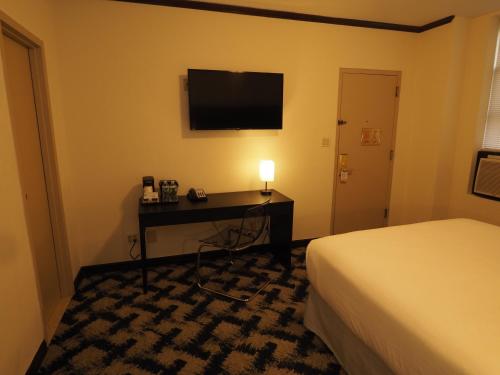 Alojamiento Oro - 1 cama grande del hotel Night Broadway. Foto 3