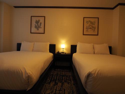 Alojamiento Oro - 2 camas dobles del hotel Night Broadway. Foto 5