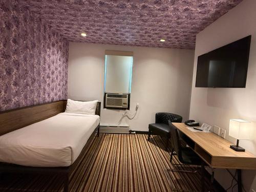 Suite Superior del hotel Night Broadway. Foto 7