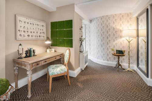 Suite con salón acristalado y 2 sofás cama - 1 cama extragrande del hotel The Lexington , Autograph Collection. Foto 2