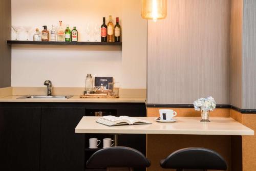 Suite con cama extragrande del hotel Gild Hall, A Thompson