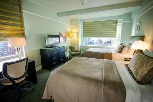 Estudio Doble Deluxe - 2 camas dobles del hotel Beacon. Foto 4