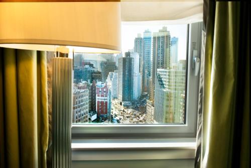 Suite Deluxe de 1 dormitorio con 2 camas dobles del hotel Beacon