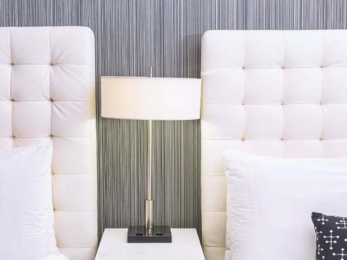 Habitación Doble Deluxe - 2 camas dobles del hotel Moderne. Foto 5