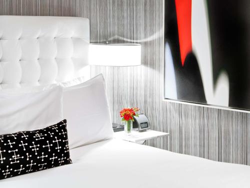 Habitación con cama extragrande - Adaptada para personas de movilidad reducida del hotel Moderne