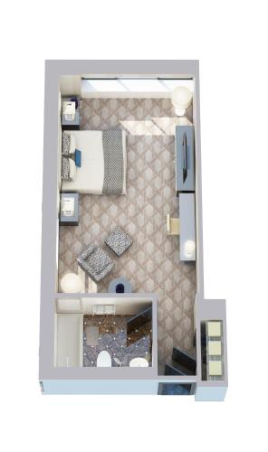 Habitación Premier con vistas al horizonte urbano y cama extragrande del hotel Lotte New York Palace. Foto 2