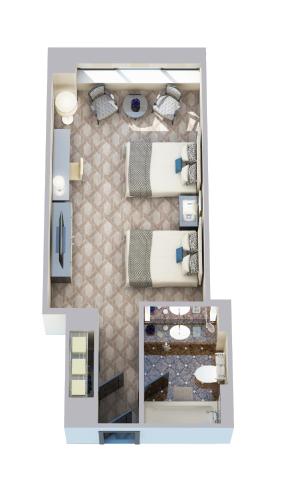 Habitación con vistas a la catedral y 2 camas dobles del hotel Lotte New York Palace. Foto 2