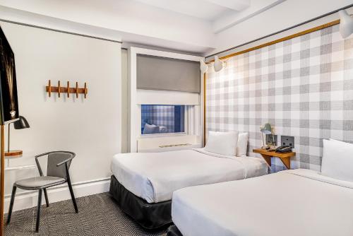 Superior - 1 o 2 camas del hotel Paramount. Foto 1