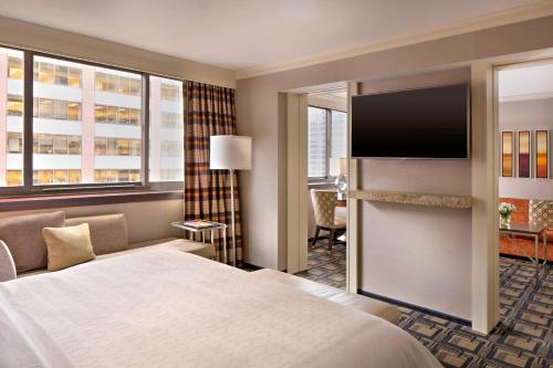 Suite Executive, 1 dormitorio, 1 cama extragrande, sofá cama del hotel Sheraton New York Times Square. Foto 1