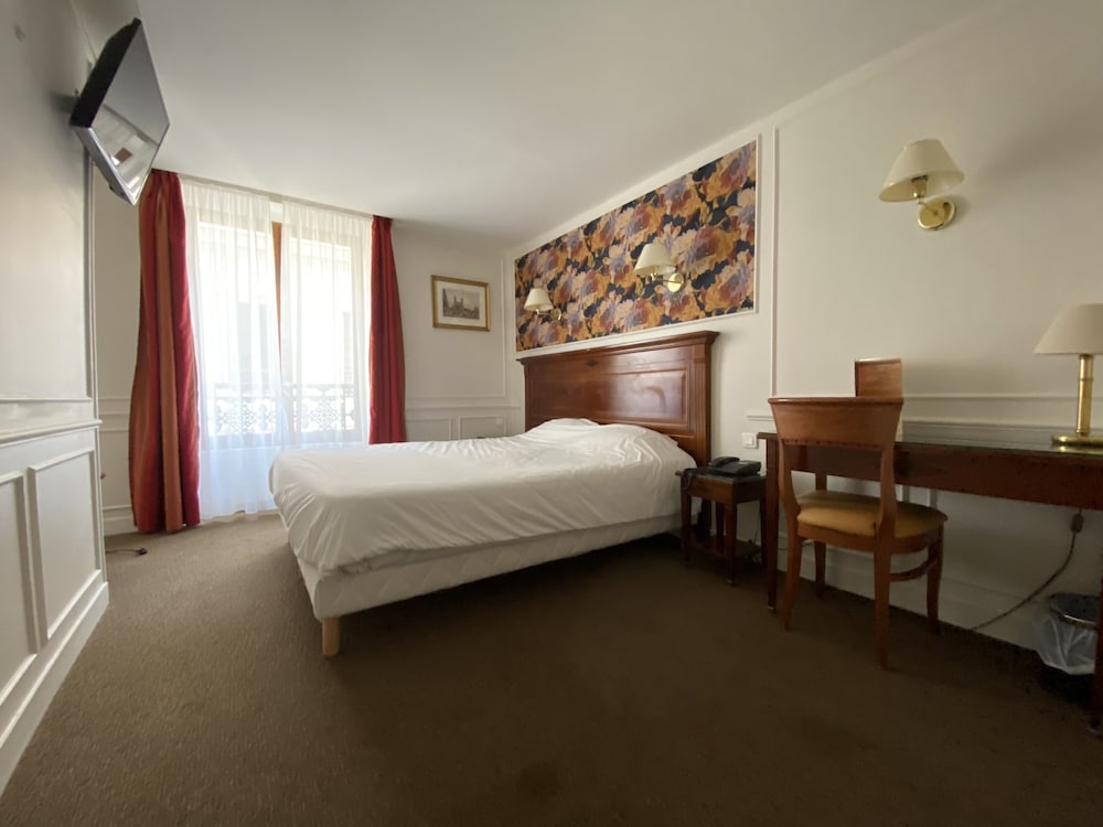 Habitación doble del hotel Touring. Foto 1