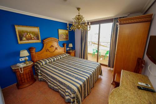 Habitación Doble Estándar del hotel Flor De La Mancha. Foto 7