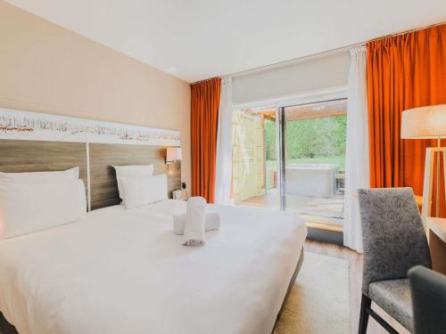 Executive Room with Private Terrace and Garden View del hotel Mercure Annecy Sur. Foto 1