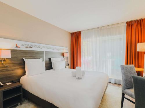 Executive Room with Private Terrace and Garden View del hotel Mercure Annecy Sur. Foto 2