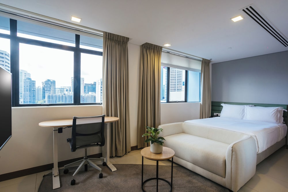 Estudio ejecutivo del hotel Novotel Living Singapore Orchard. Foto 1