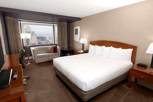 Habitación con vistas al perfil urbano - 1 cama extragrande del hotel Parc 55 San Francisco - A Hilton. Foto 1